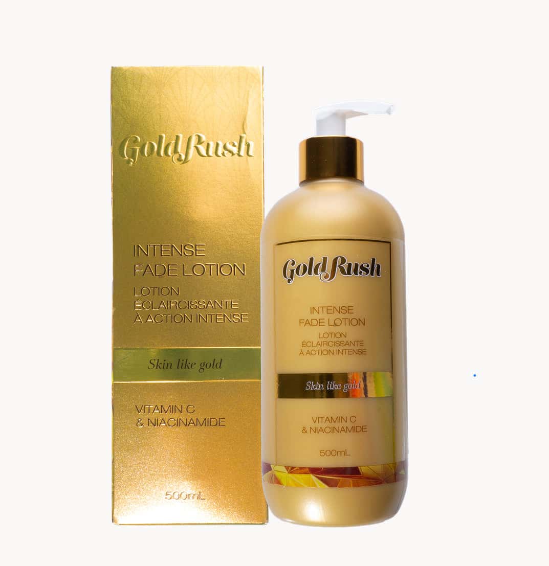 Gold Rush Intense Fade Lotion - Skin brightening and lightening lotion for all skin tones, including black, caramel, and fair skin. The product features a golden-colored packaging and bottle, containing a moisturizing formula with vitamins C and niacinamide to even out skin tone.
